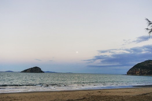 As the sun sets the moon rises over Great Keppel Island